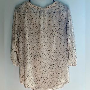 Super cute blouse!! See through lots of compliments!! Dress up or down!